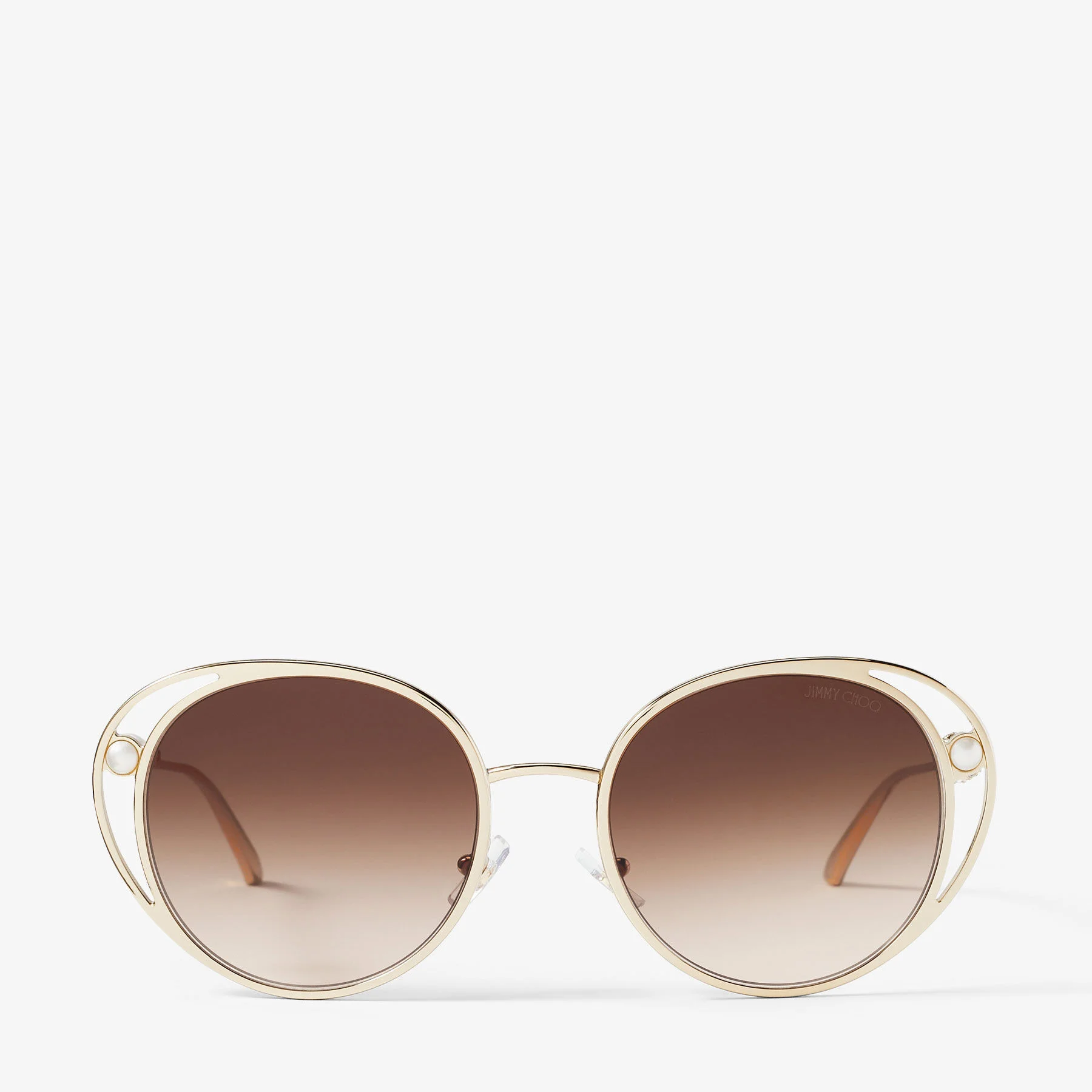 Angela
Pale Gold Oval Sunglasses - 1