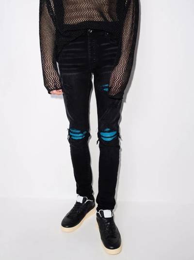 AMIRI MX1 Cracked Paint skinny jeans outlook