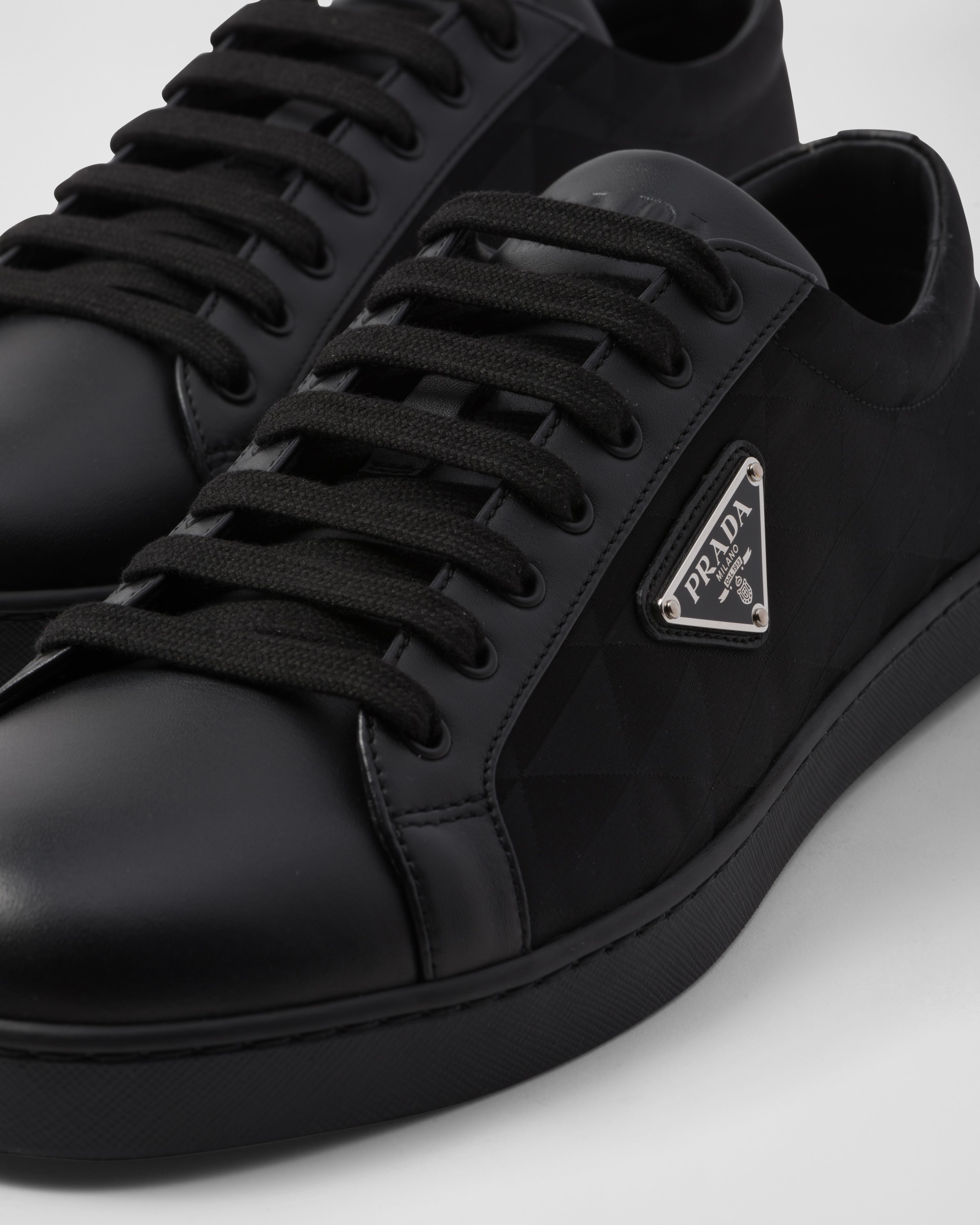 Prada Leather and Re-Nylon sneakers | REVERSIBLE