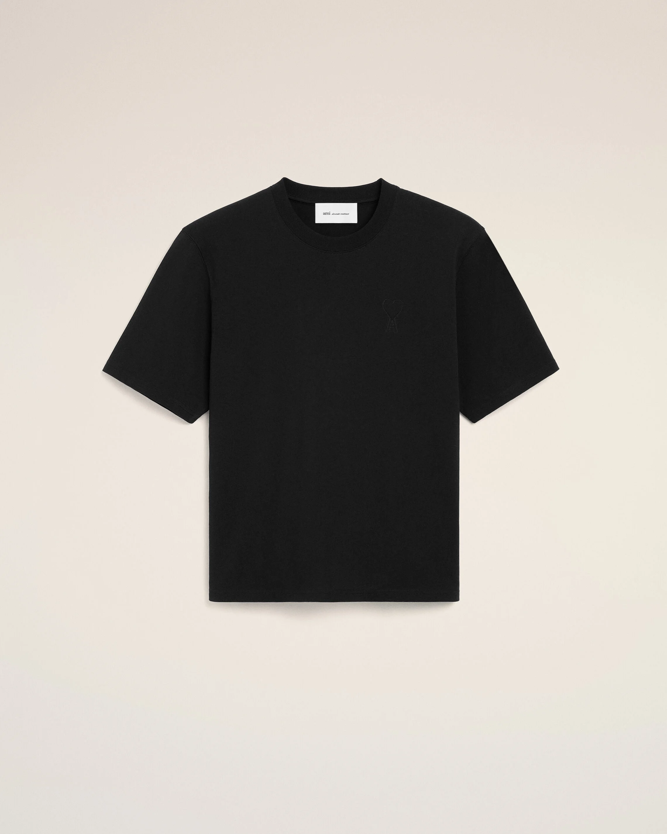 BLACK COTTON T-SHIRT WITH EMBOSSED AMI DE COEUR - 1
