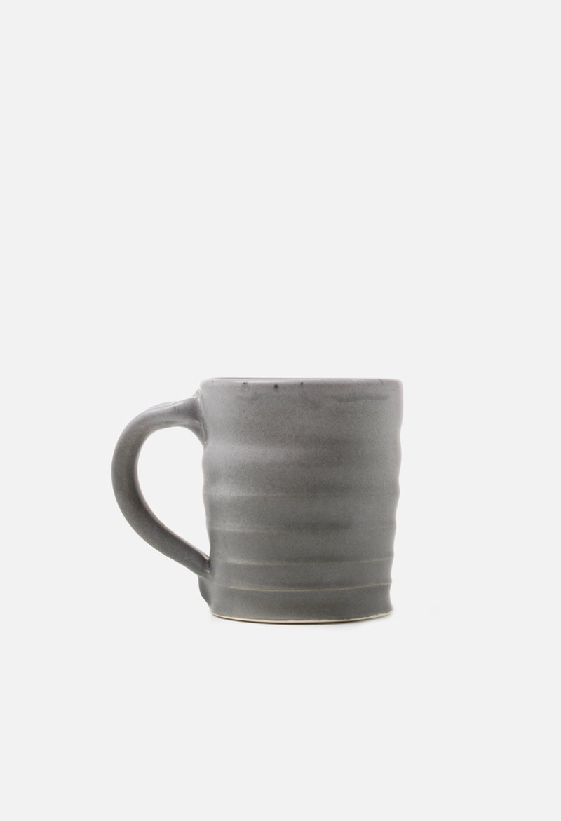 John Elliott CERAMIC MUG outlook