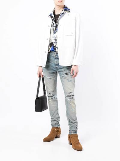 AMIRI MX1 ripped skinny jeans outlook