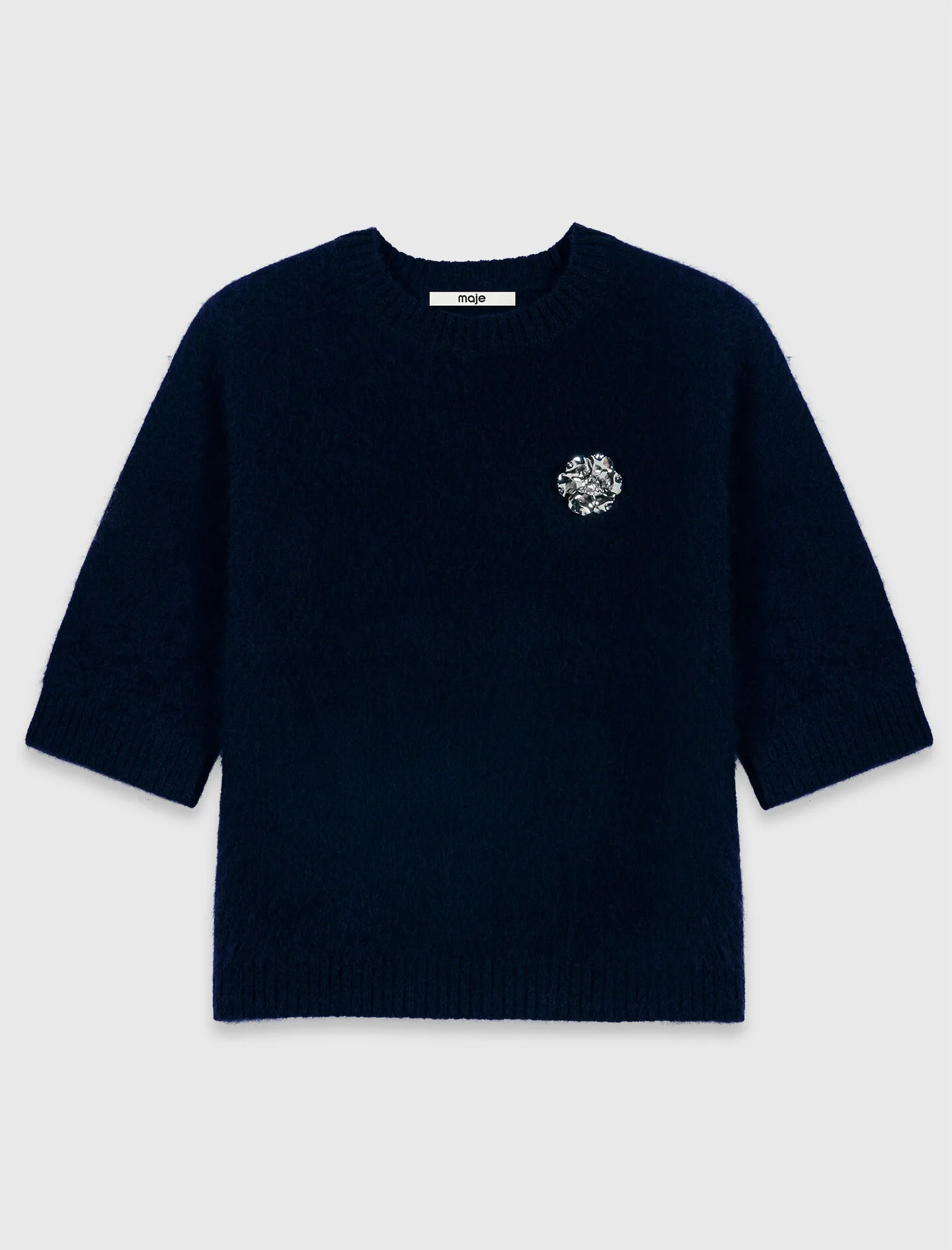Sweater with floral brooch - 1