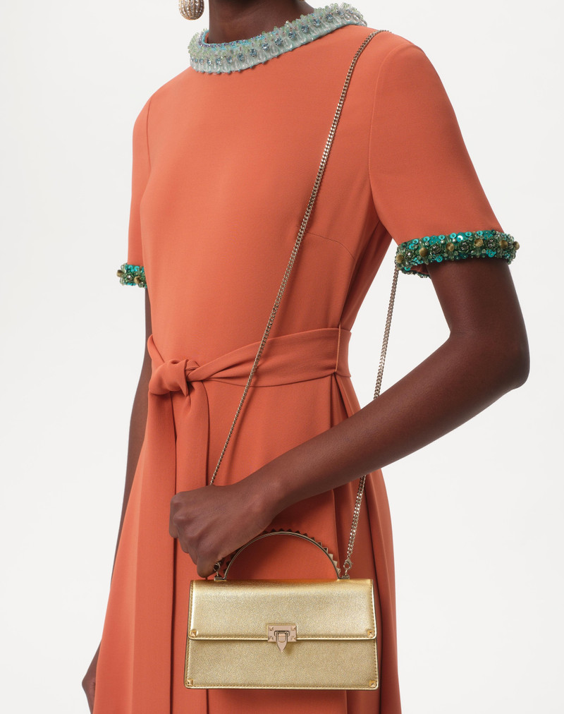 ROCKSTUD MINI LAMINATED CALFSKIN HANDBAG 7