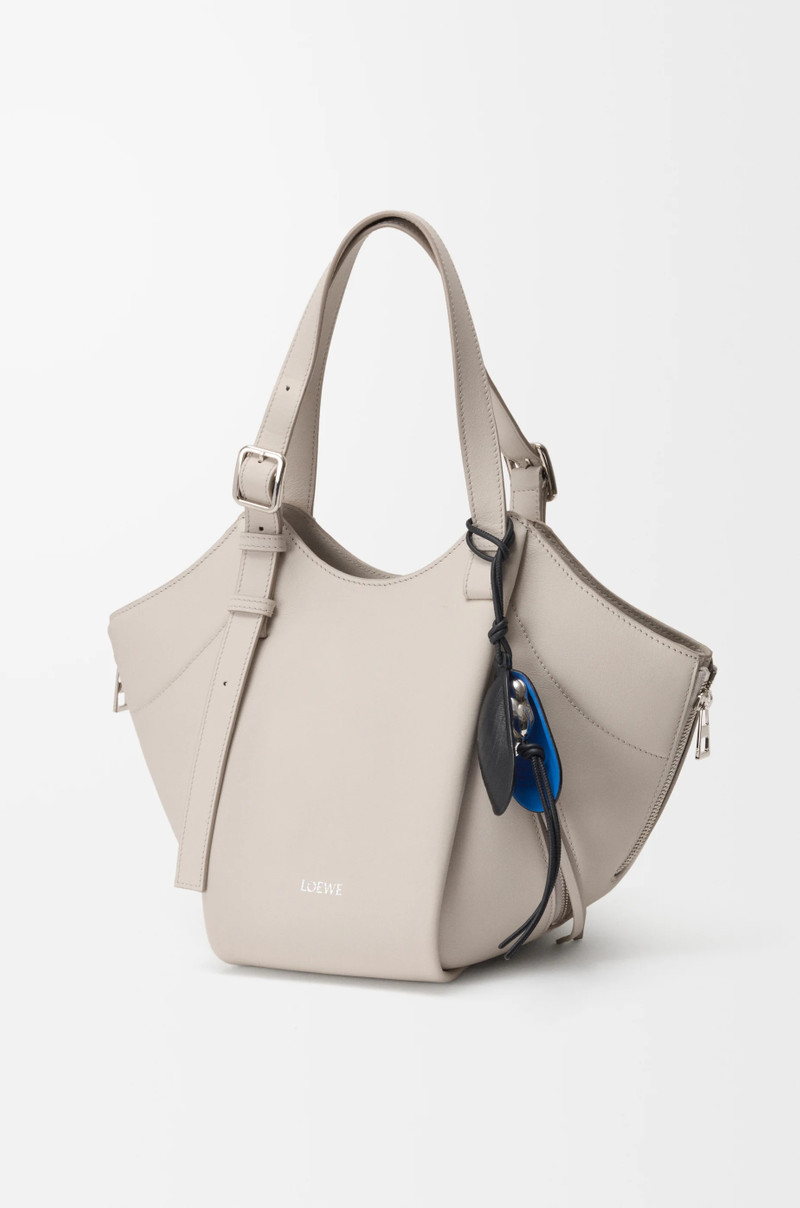 Shell charm in leather 3