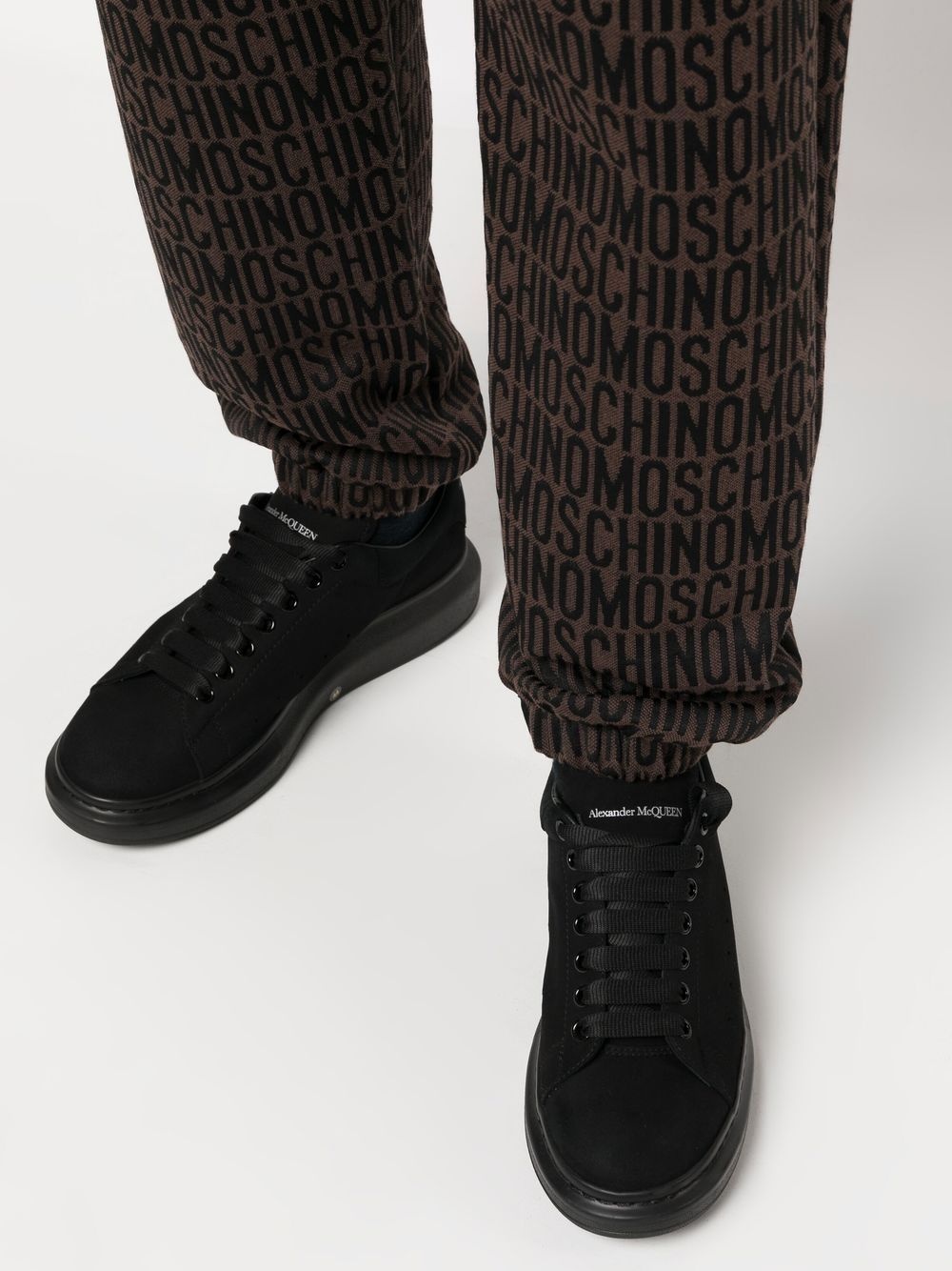all-over embroidered logo track pants - 5