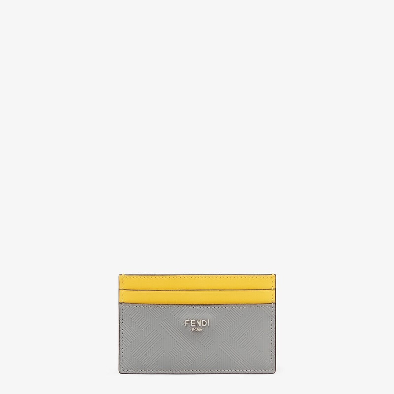 Gray leather card holder with embossed FF print. Yellow leather details. Made in Italy 1