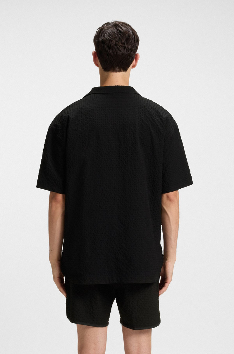 HUGO WAFFLE-STRUCTURED SWIM SHORTS WITH EMBROIDERED STACKED LOGO outlook