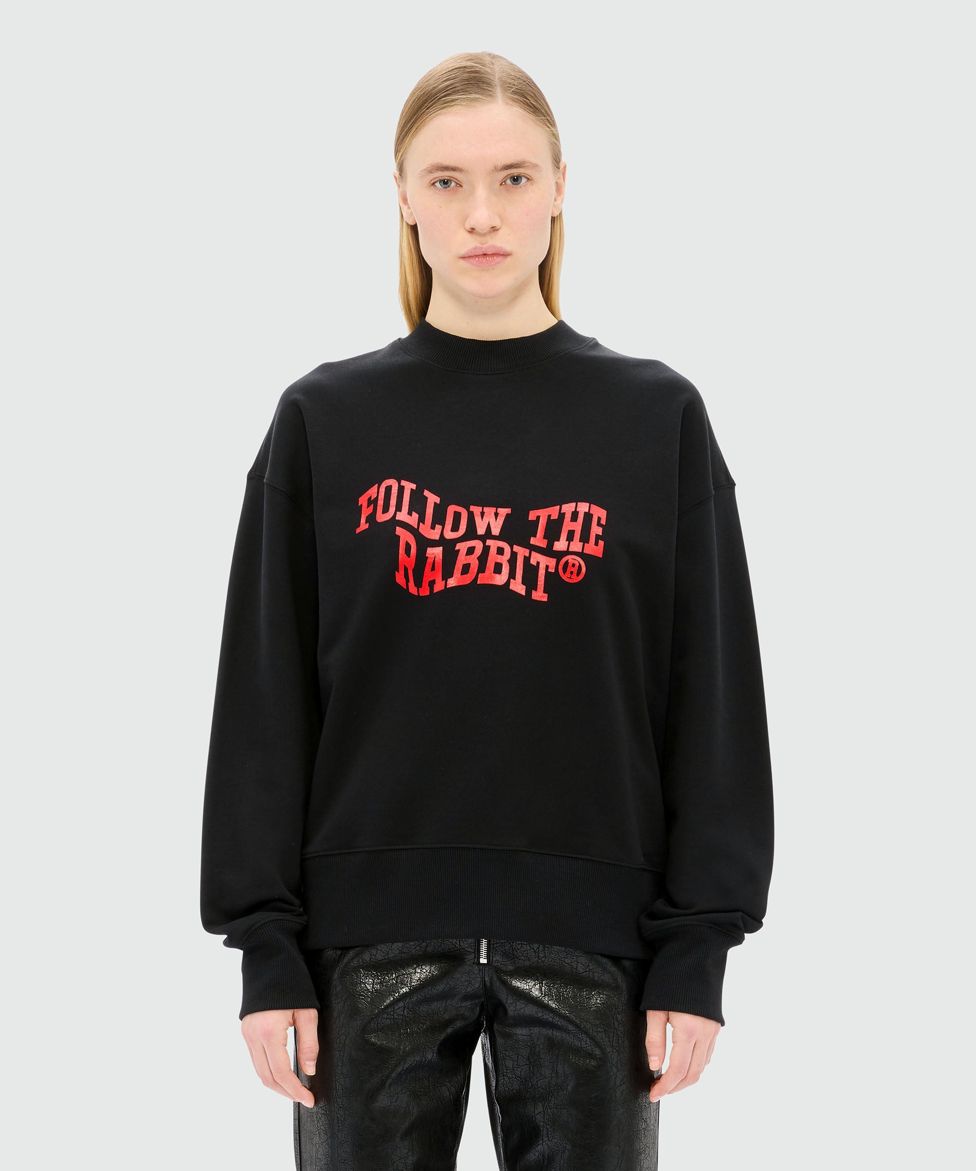 Black jersey sweatshirt with "Follow the Rabbit®" quote - 2