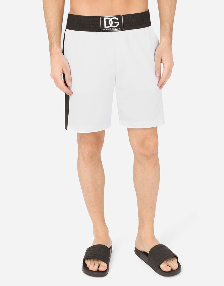 Two-tone mid-length swim trunks with DG patch - 4