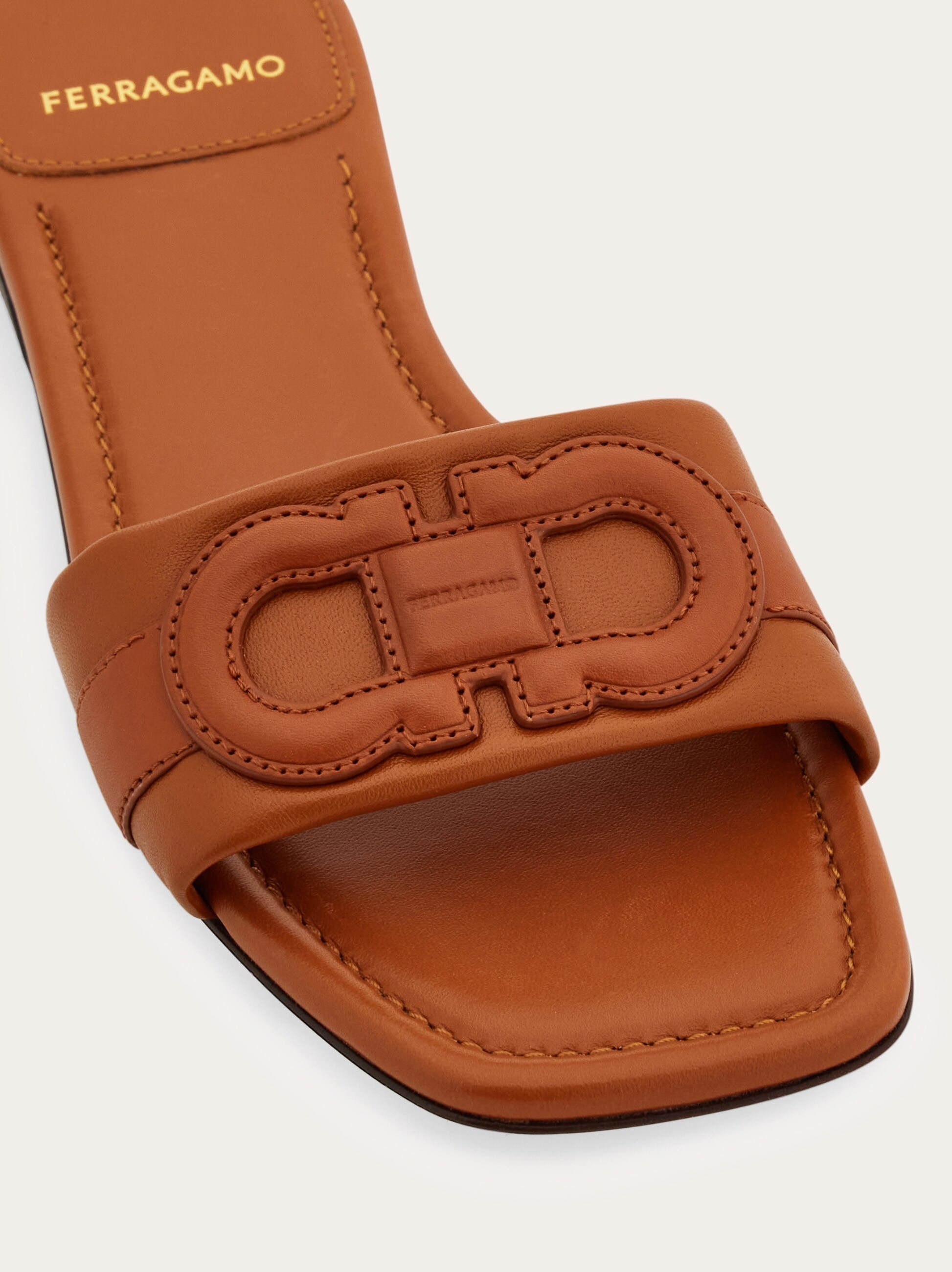 Gancini slide - 6