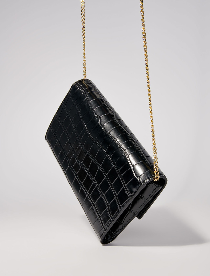 Croc-effect embossed leather bag 5