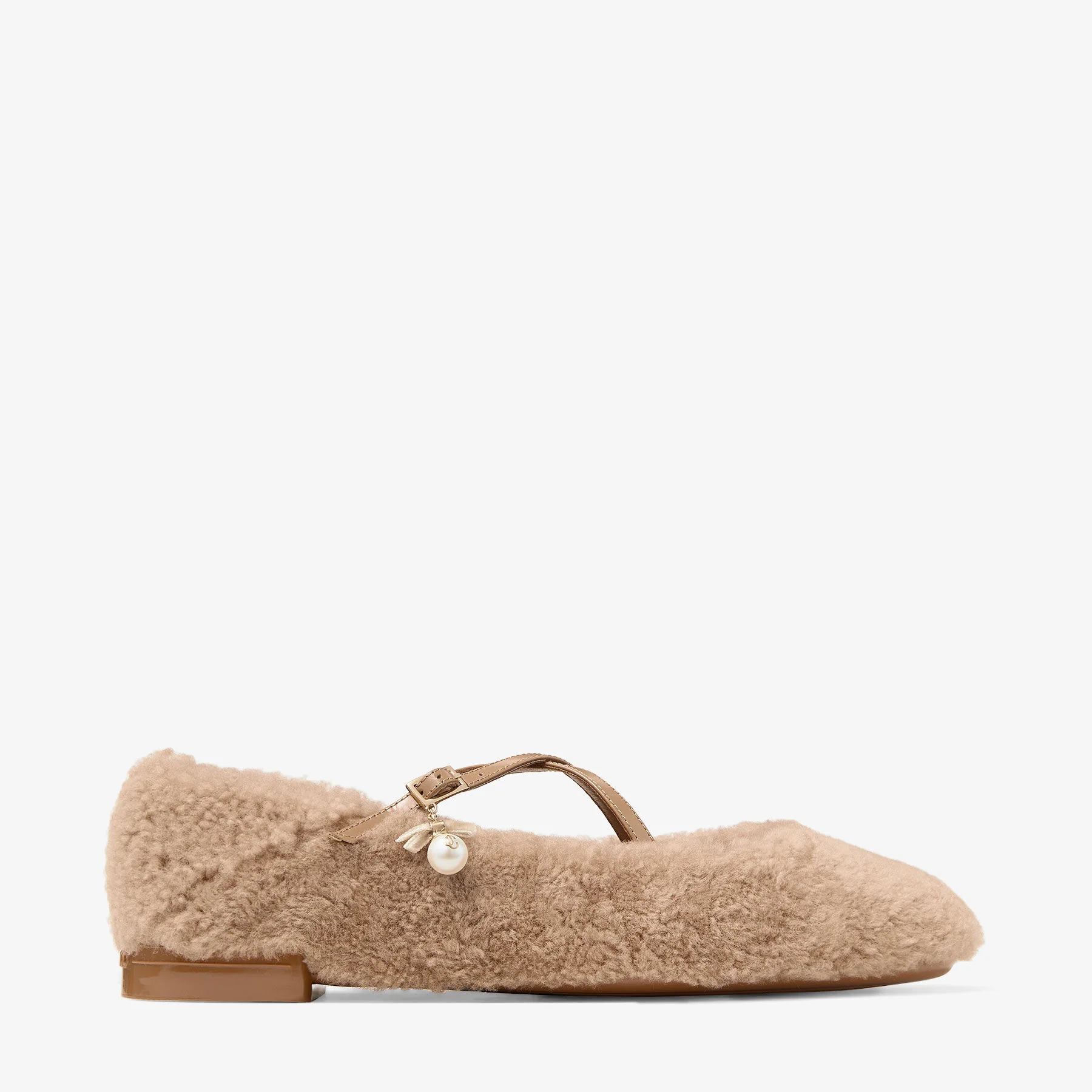 Eleri Ballerina S
Toffee Shearling Ballerina Pumps with Pearl Charm - 1