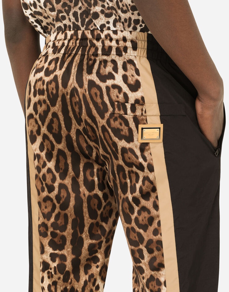 Jogging pants with leopard-print inserts - 5