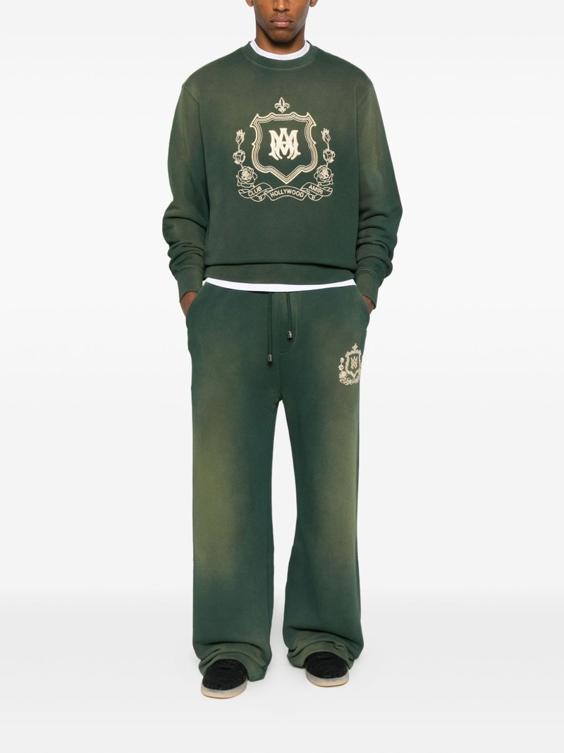 AMIRI crest-embellished track pants outlook