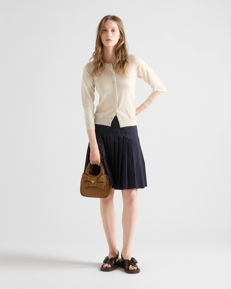Prada Padded Re-Nylon mini-bag with bow outlook