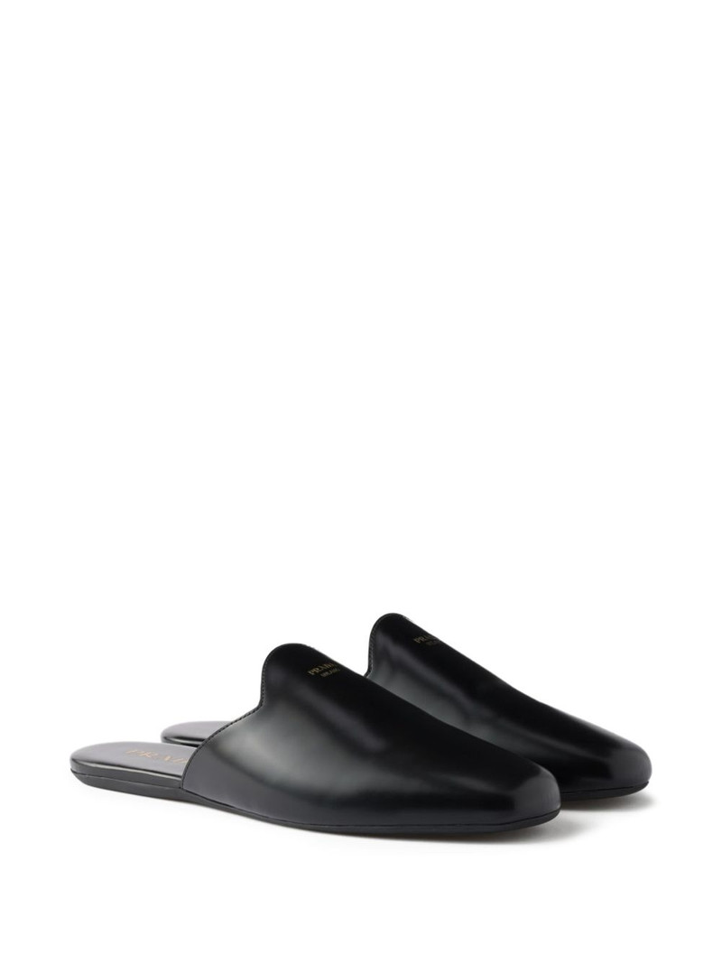 Prada embossed-logo leather mules outlook