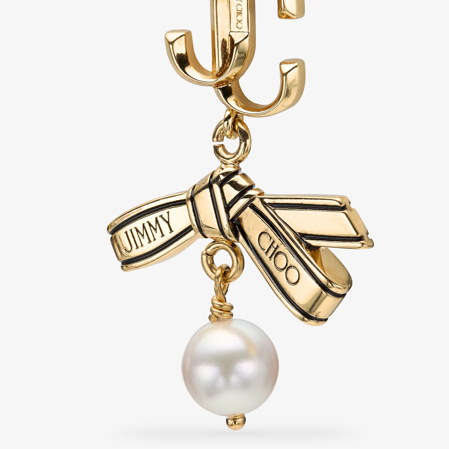 Ribbon Pearl Earring
Gold Metal Ribbon Pearl Earring - 2