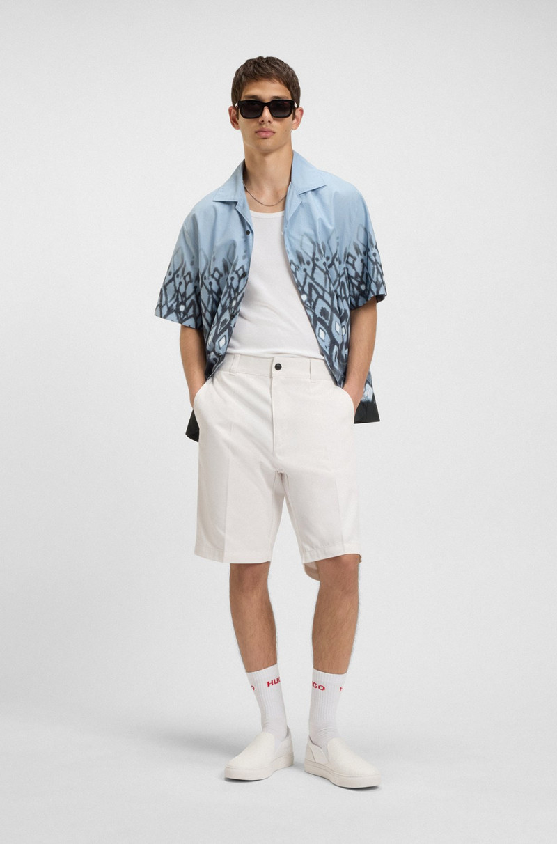 HUGO REGULAR-FIT SHORTS WITH SLIM LEG AND BUTTONED POCKETS outlook