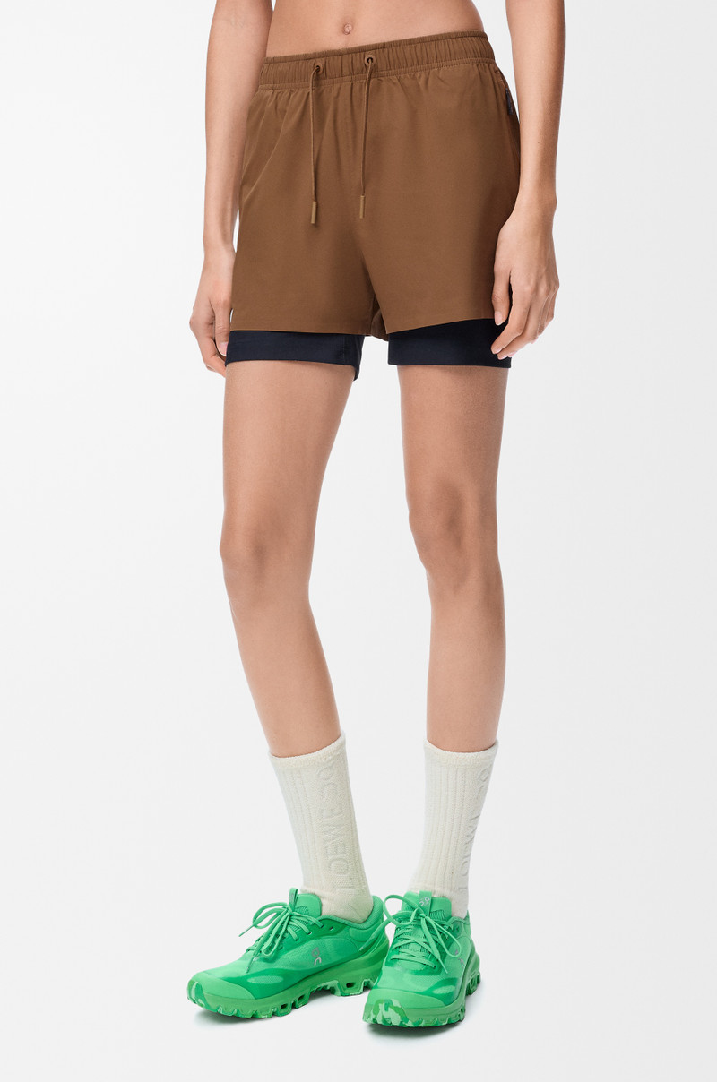 Performance shorts in technical shell 3