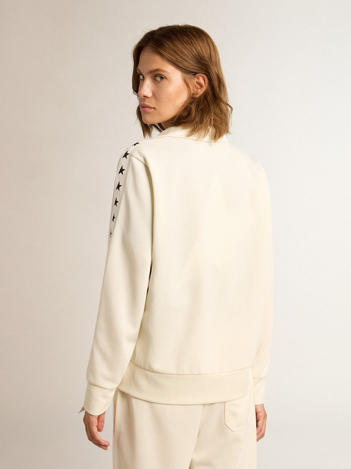 Women’s white zipped sweatshirt with white strip and black stars - 4