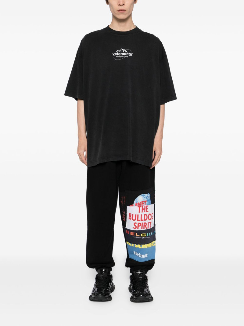 VETEMENTS graphic-print trousers outlook