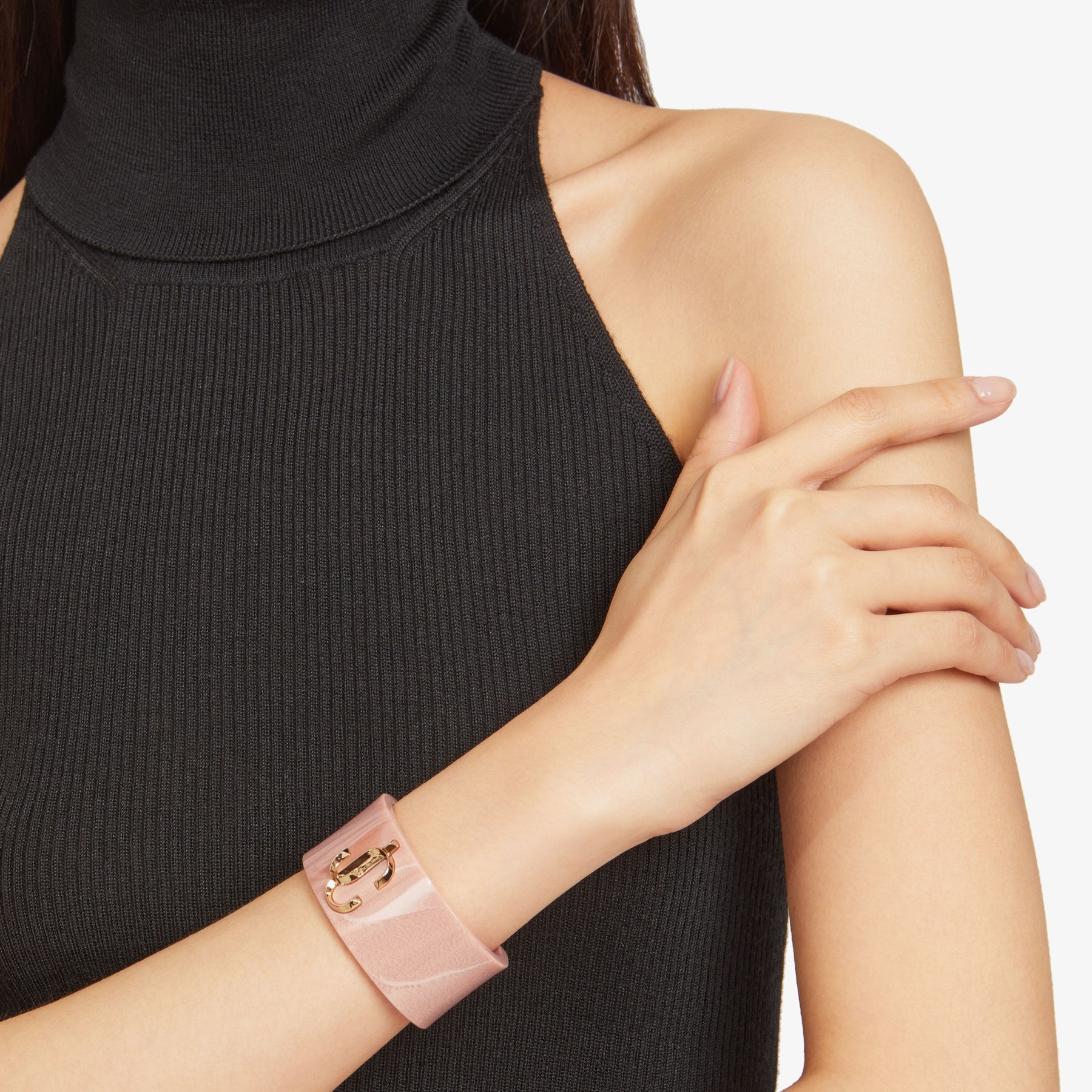 JC Cuff
Ballet Pink Acrylic Cuff Bracelet with Gold-Finish Metal JC Emblem - 2