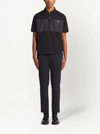 Prada triangle-logo panelled polo shirt outlook