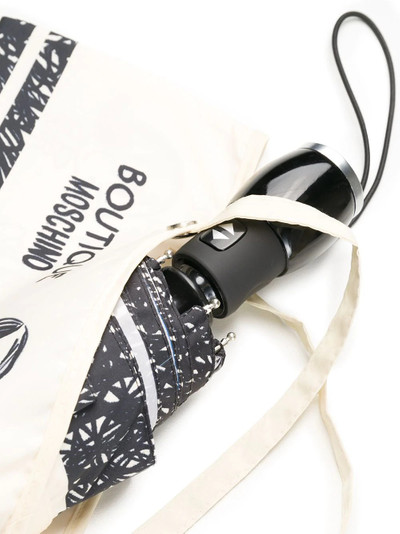 Moschino cartoon print umbrella outlook