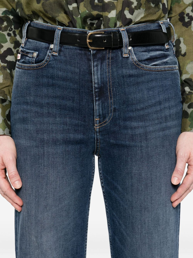 whiskering-effect jeans 5