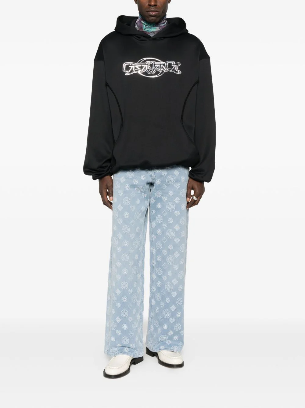 monogram-pattern jeans - 1