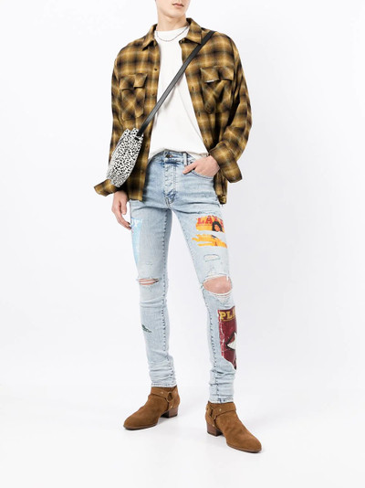 AMIRI x Playboy magazine print super-skinny jeans outlook