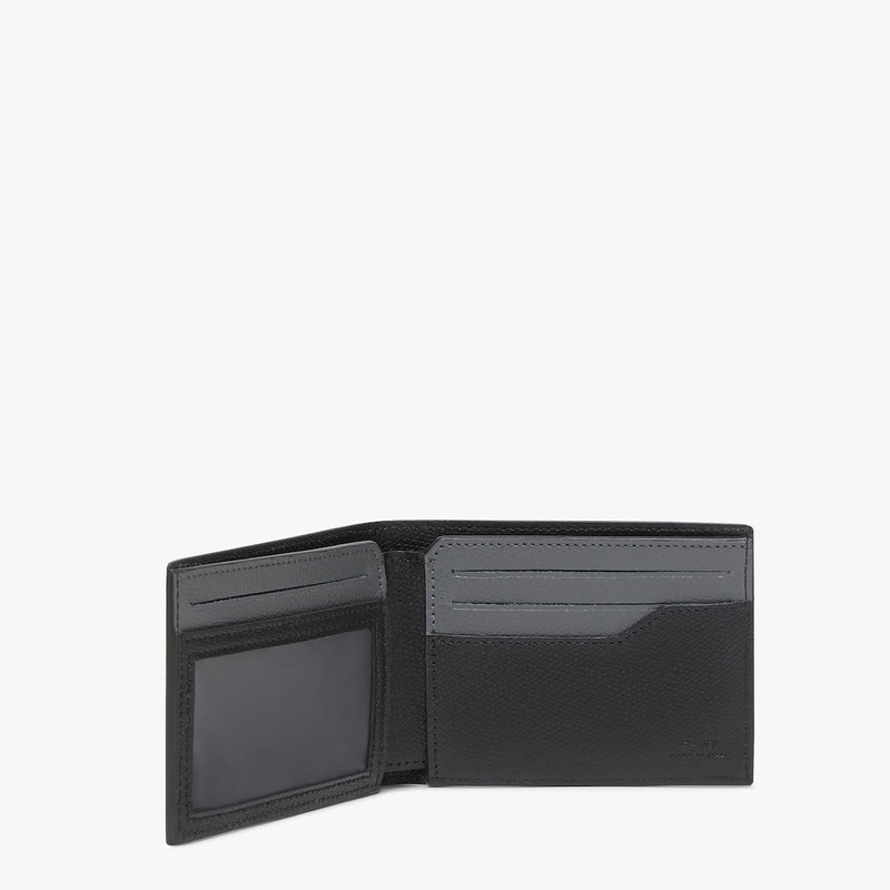 FENDI Bi-fold wallet with six cardholder slots and one banknote compartment. Made of textured fabric with  outlook