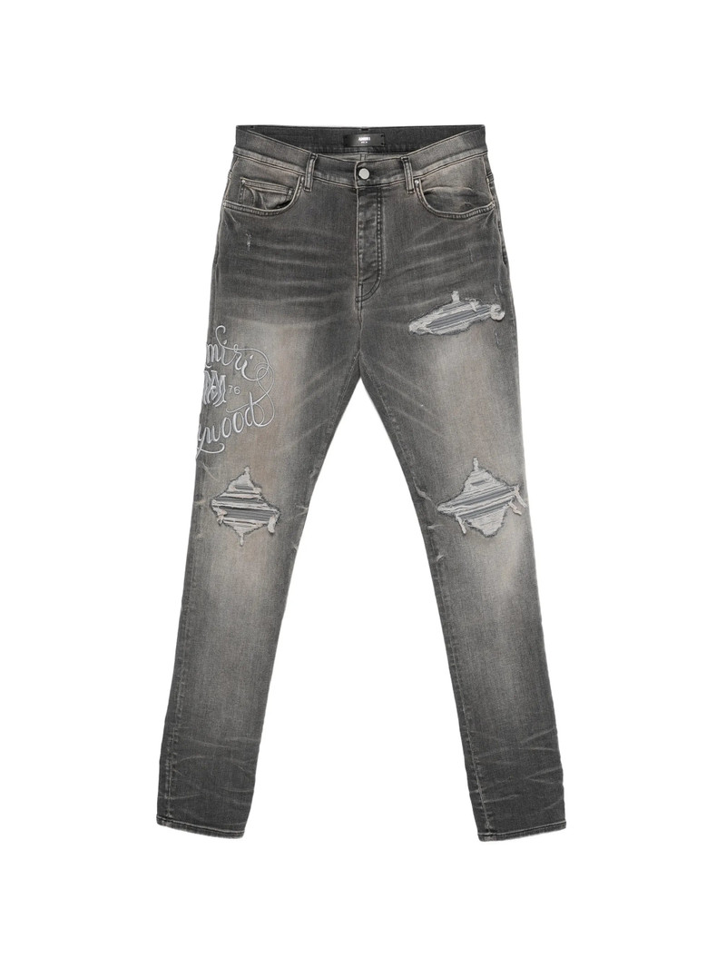 Amiri Ripped Embroidery Jeans 1