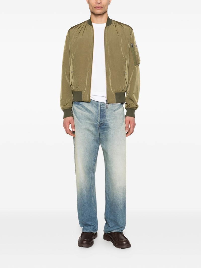 Moncler reversible logo-patch bomber jacket outlook