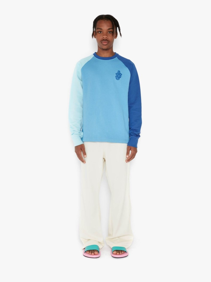 JW Anderson press-stud detail bootcut trousers outlook