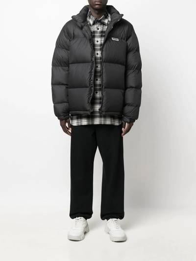 VETEMENTS logo-print puffer jacket outlook