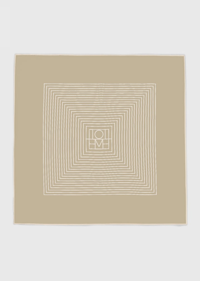 Centered monogram silk scarf peanut butter 1