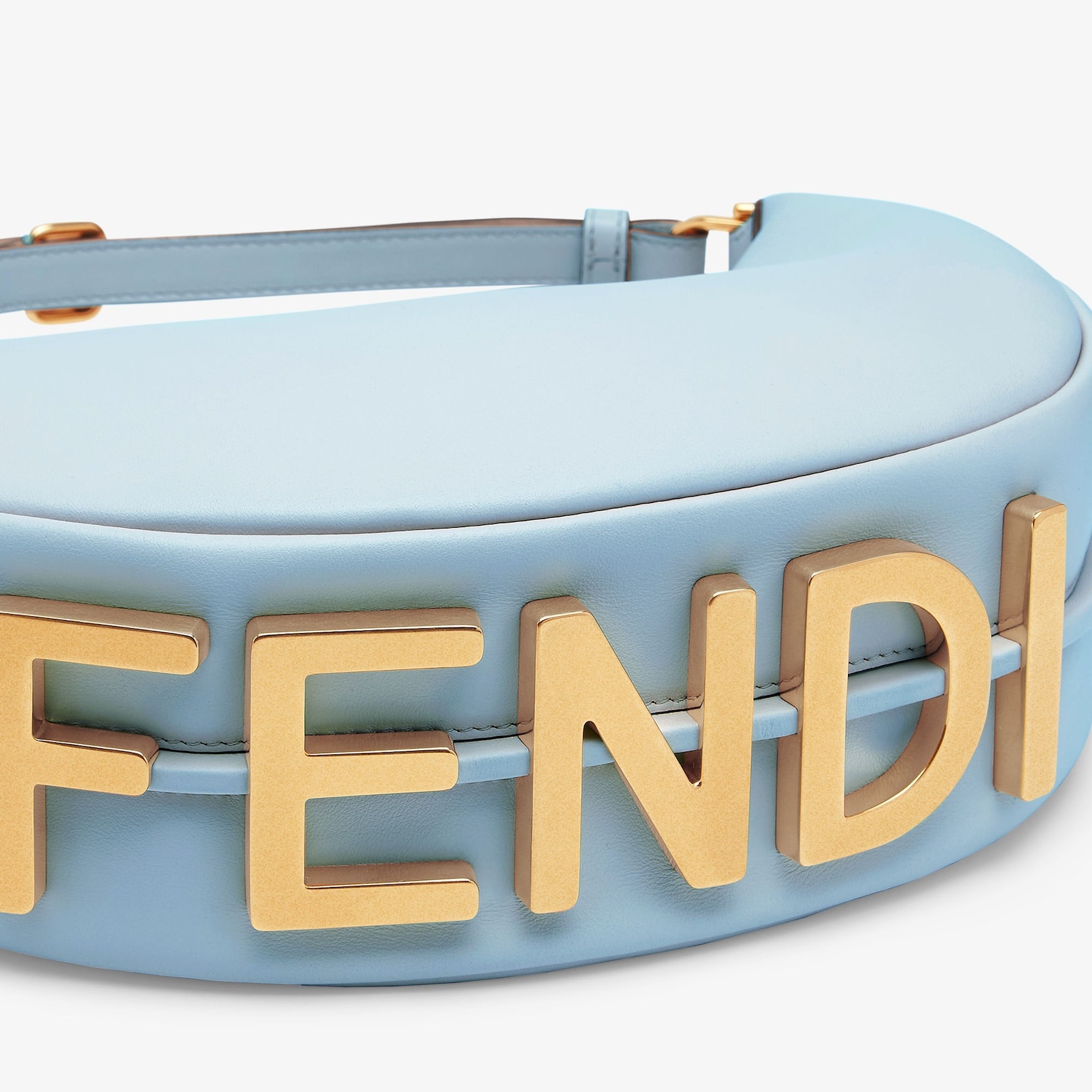 Small hobo bag made of soft light blue leather, with vintage gold metal FENDI lettering visible when - 6