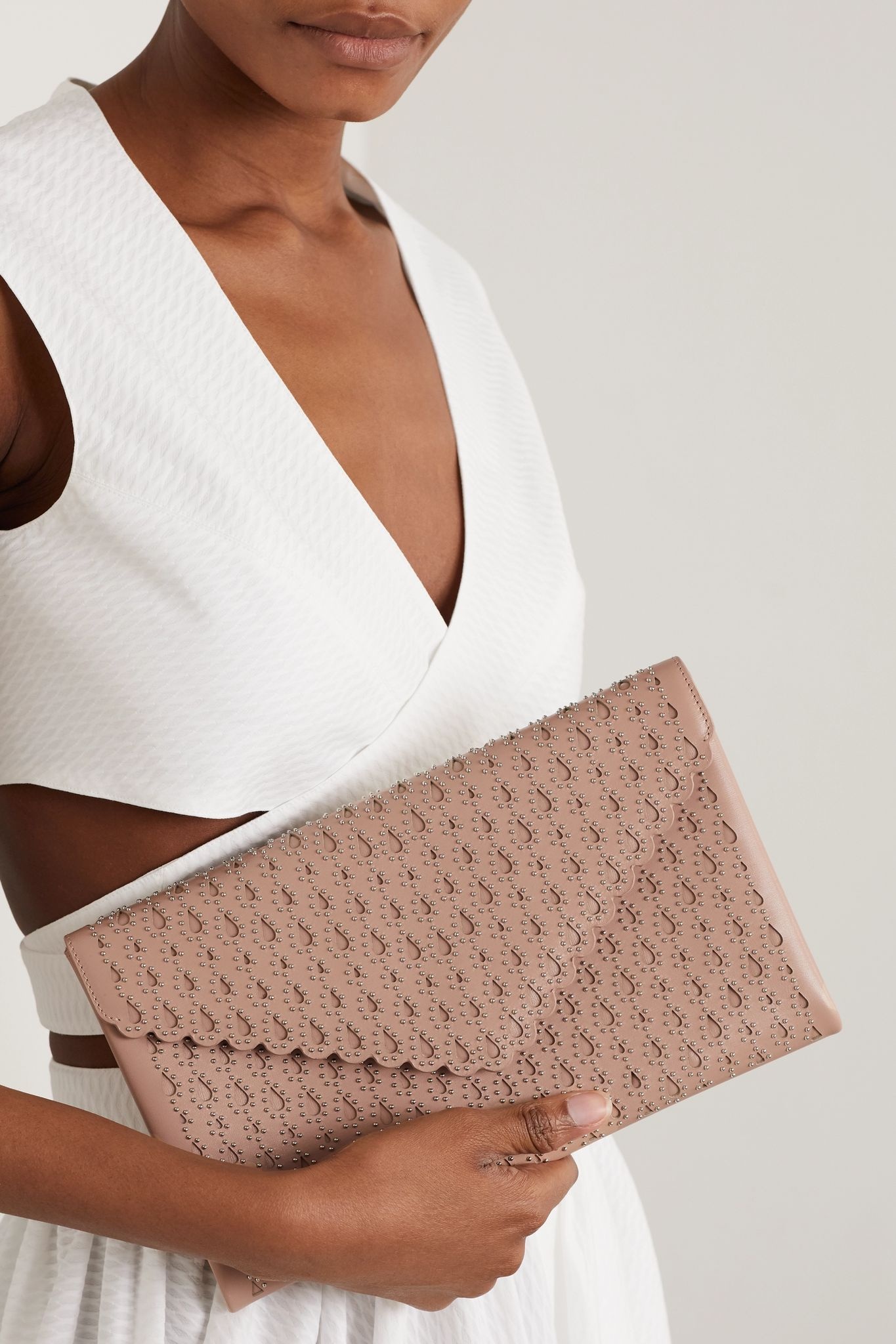 Studded laser-cut leather clutch - 2