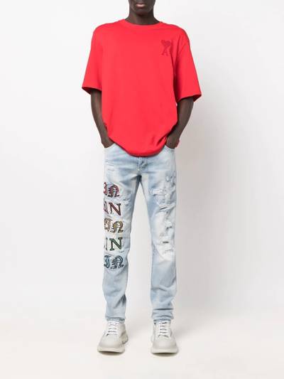 PHILIPP PLEIN patch-lettering distressed jeans outlook