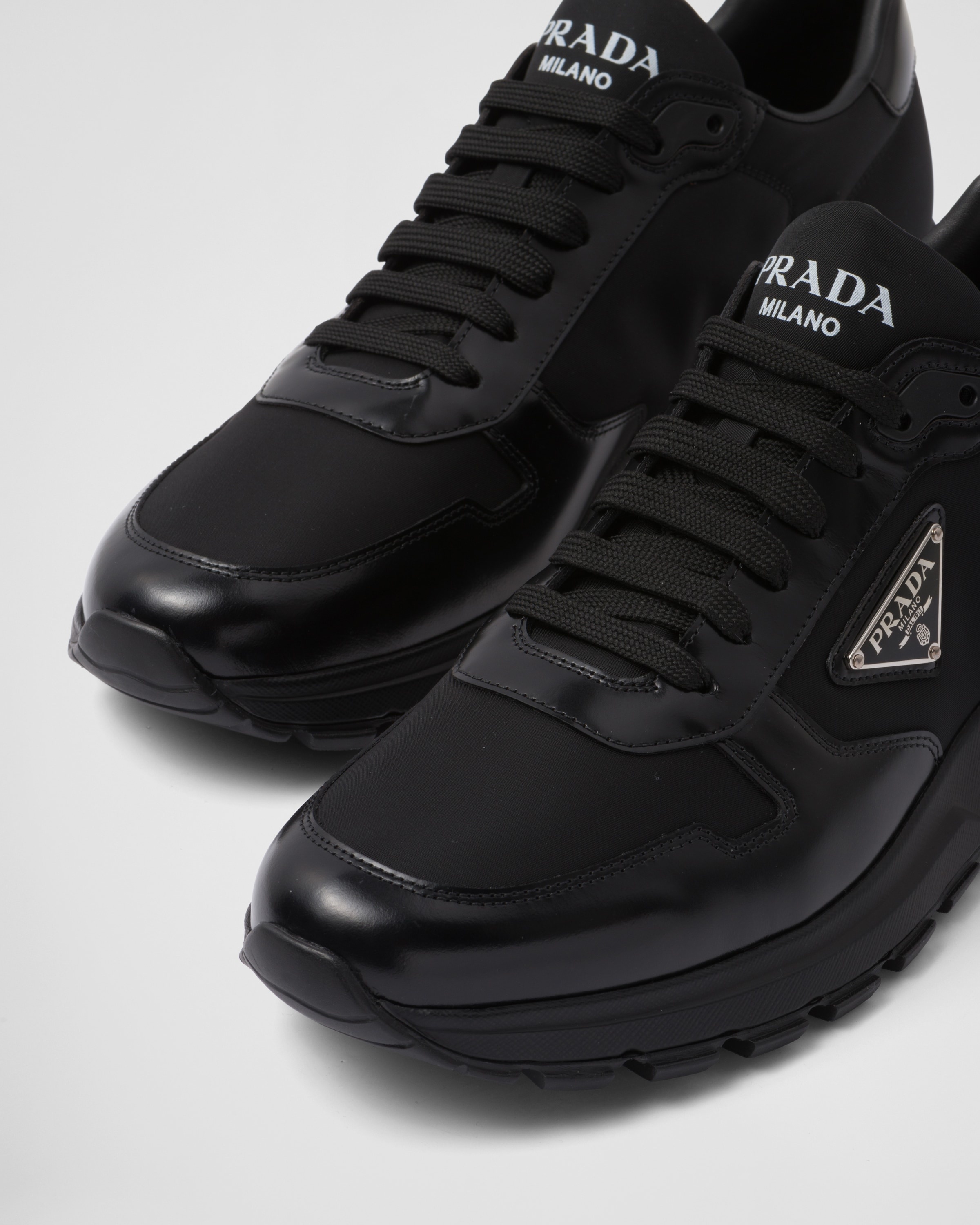 Prada Prada Re-Nylon and brushed leather sneakers | REVERSIBLE