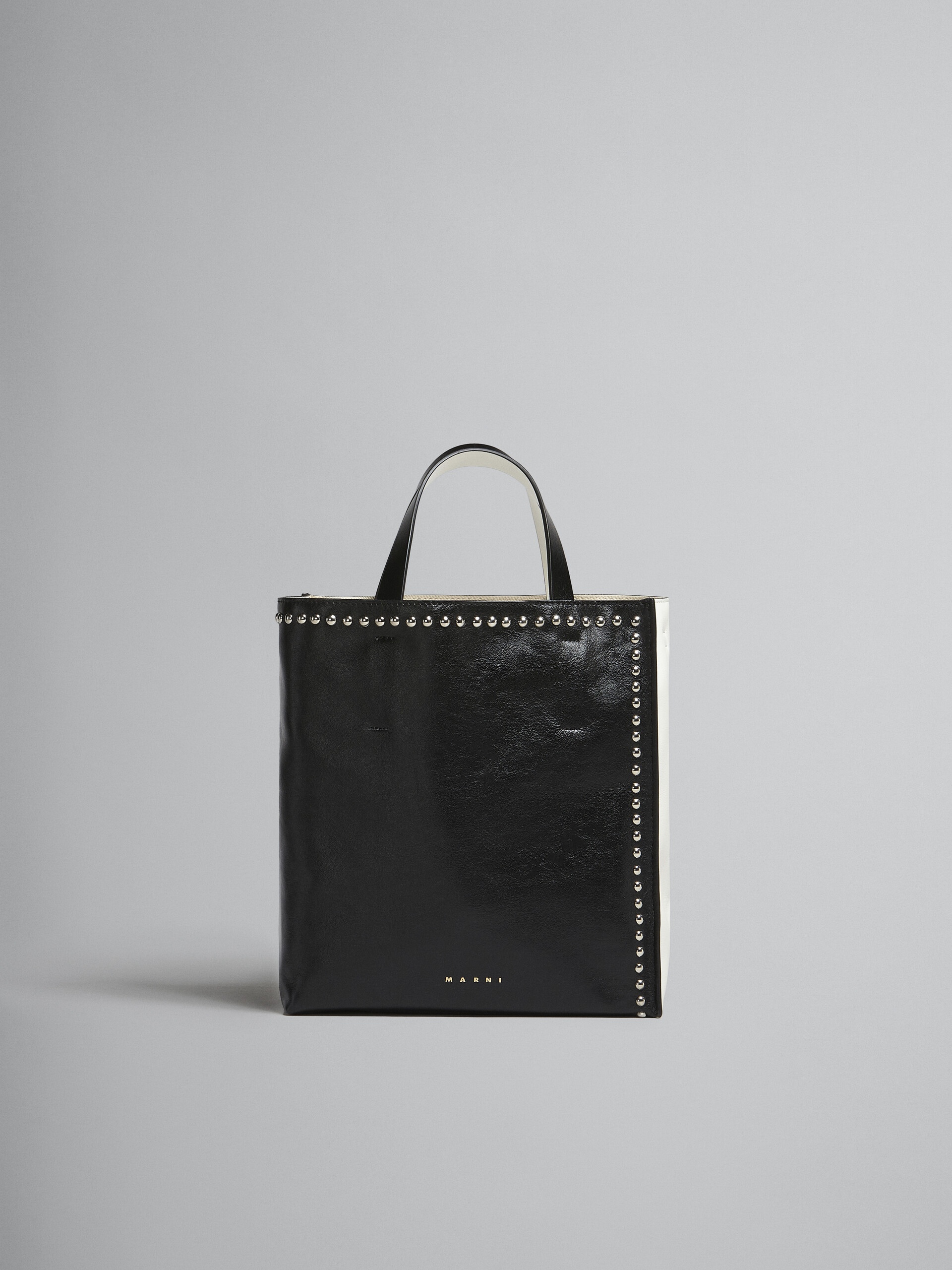 MUSEO SOFT SMALL BAG IN BLACK AND WHITE LEATHER WITH STUDS - 1