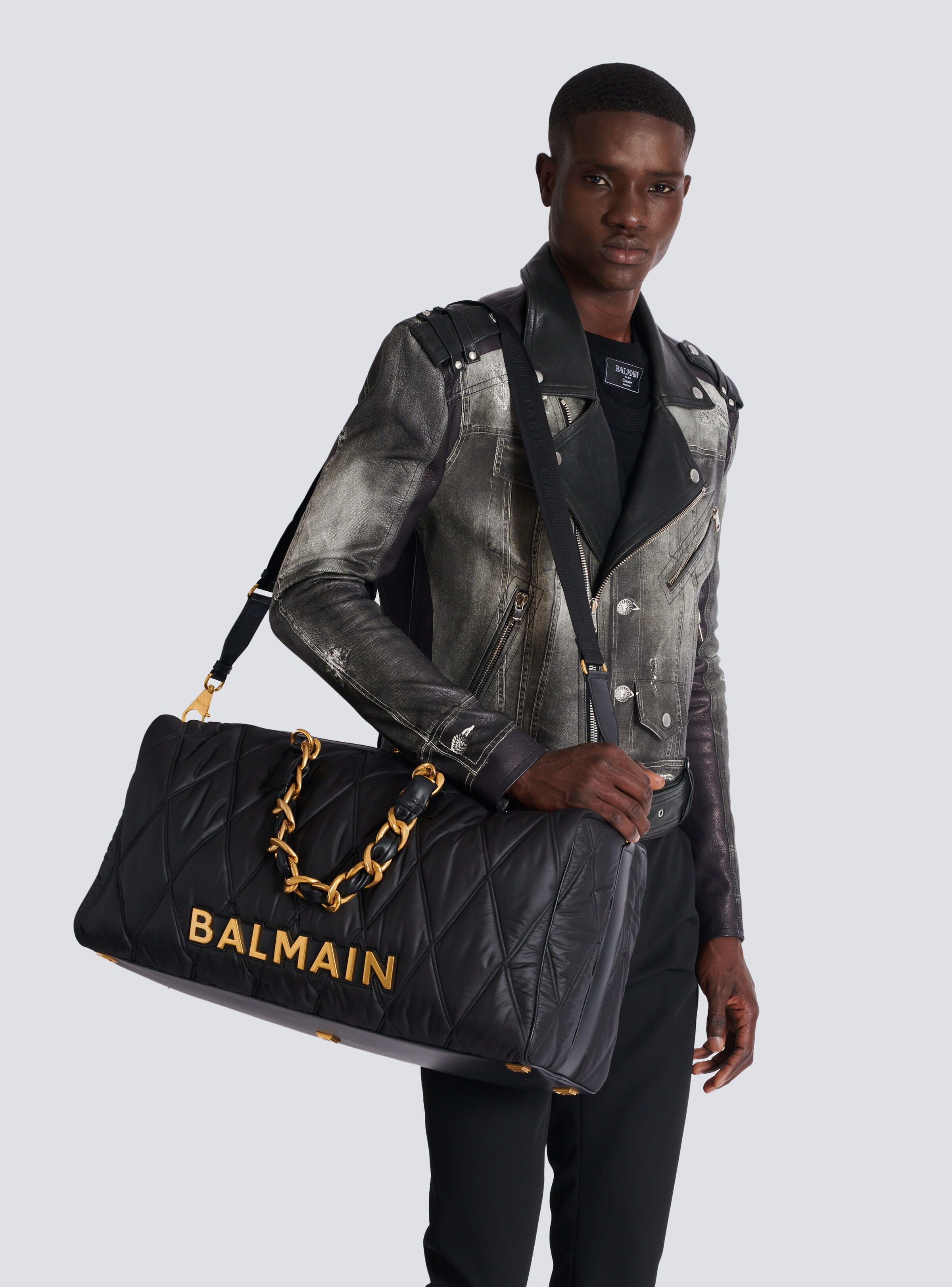 Quilted nylon travel bag with diamond motif - 8