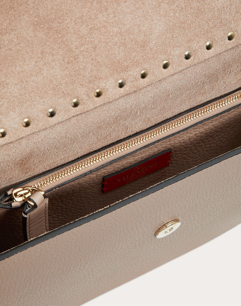 Rockstud Grainy Calfskin Clutch 4