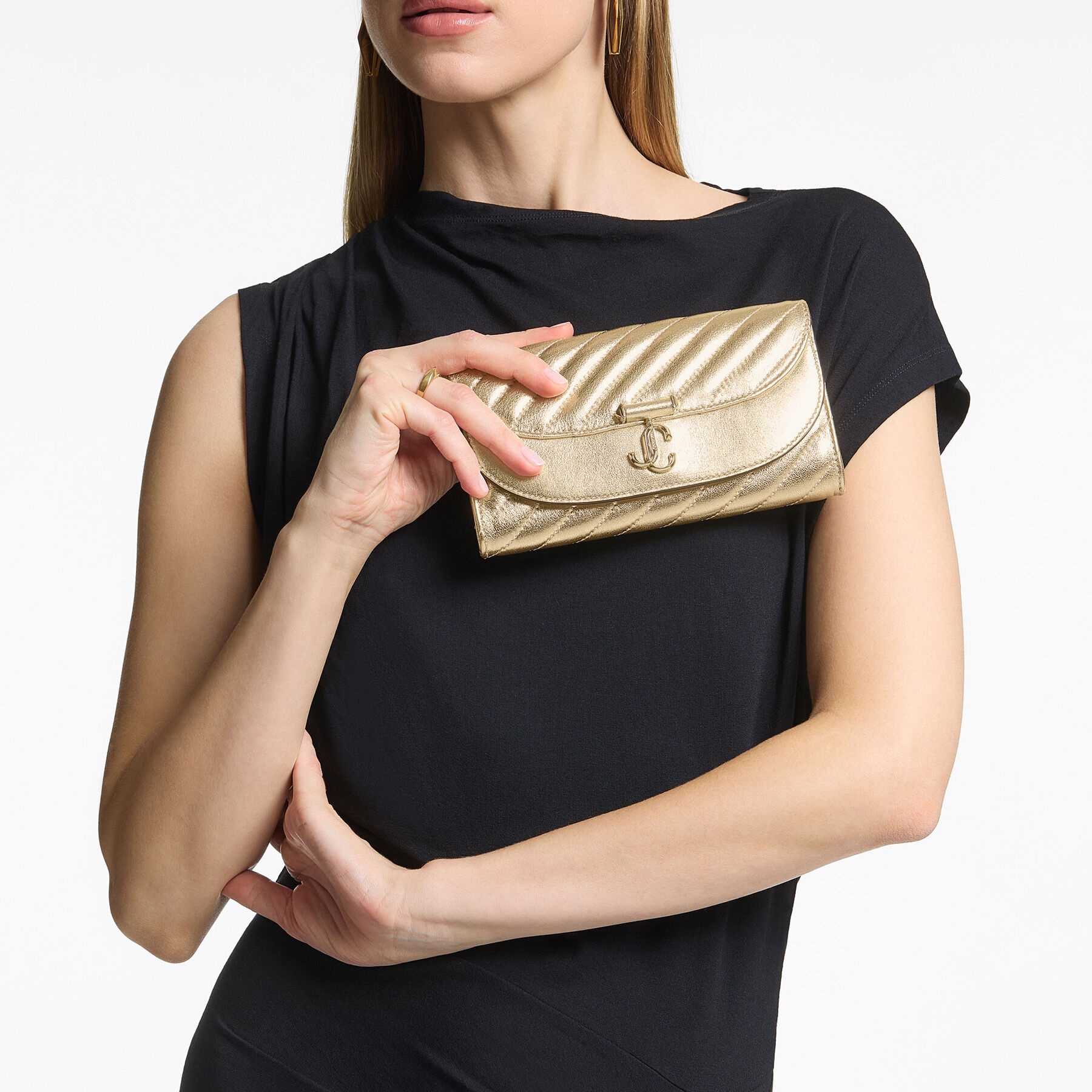 Avenue Curve Wallet Chain
Shiny Gold Quilted Metallic Leather Clutch - 2
