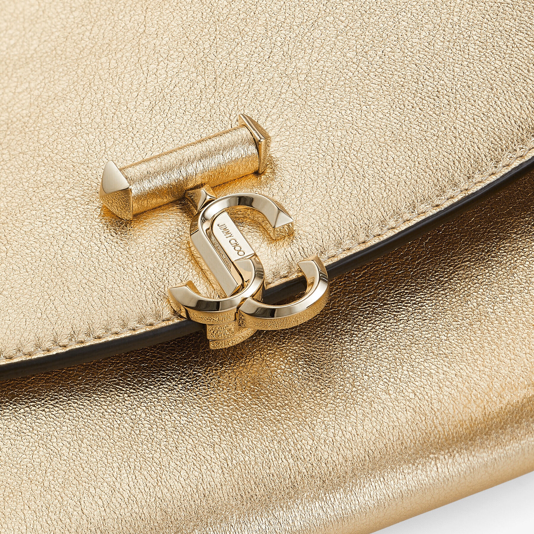 JC Envelope Pouch
Gold Metallic Nappa Pouch with JC Emblem - 4