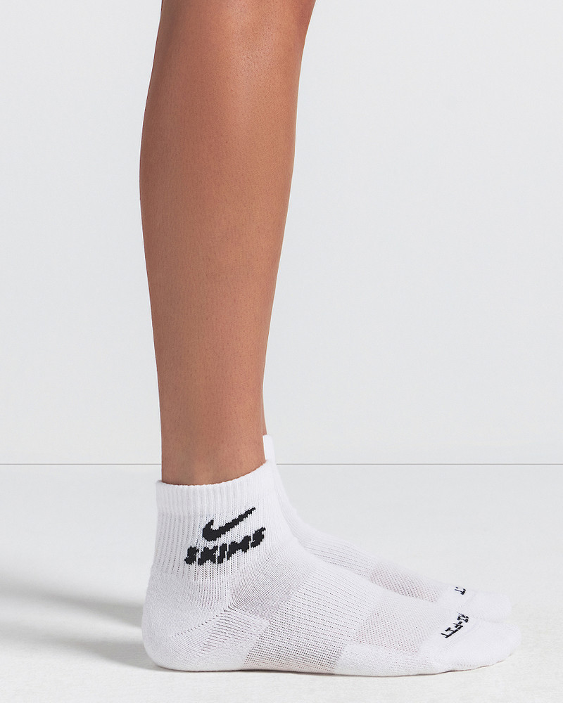 Nike NikeSKIMS Women's Dri-FIT Quarter Socks (3 Pairs) outlook