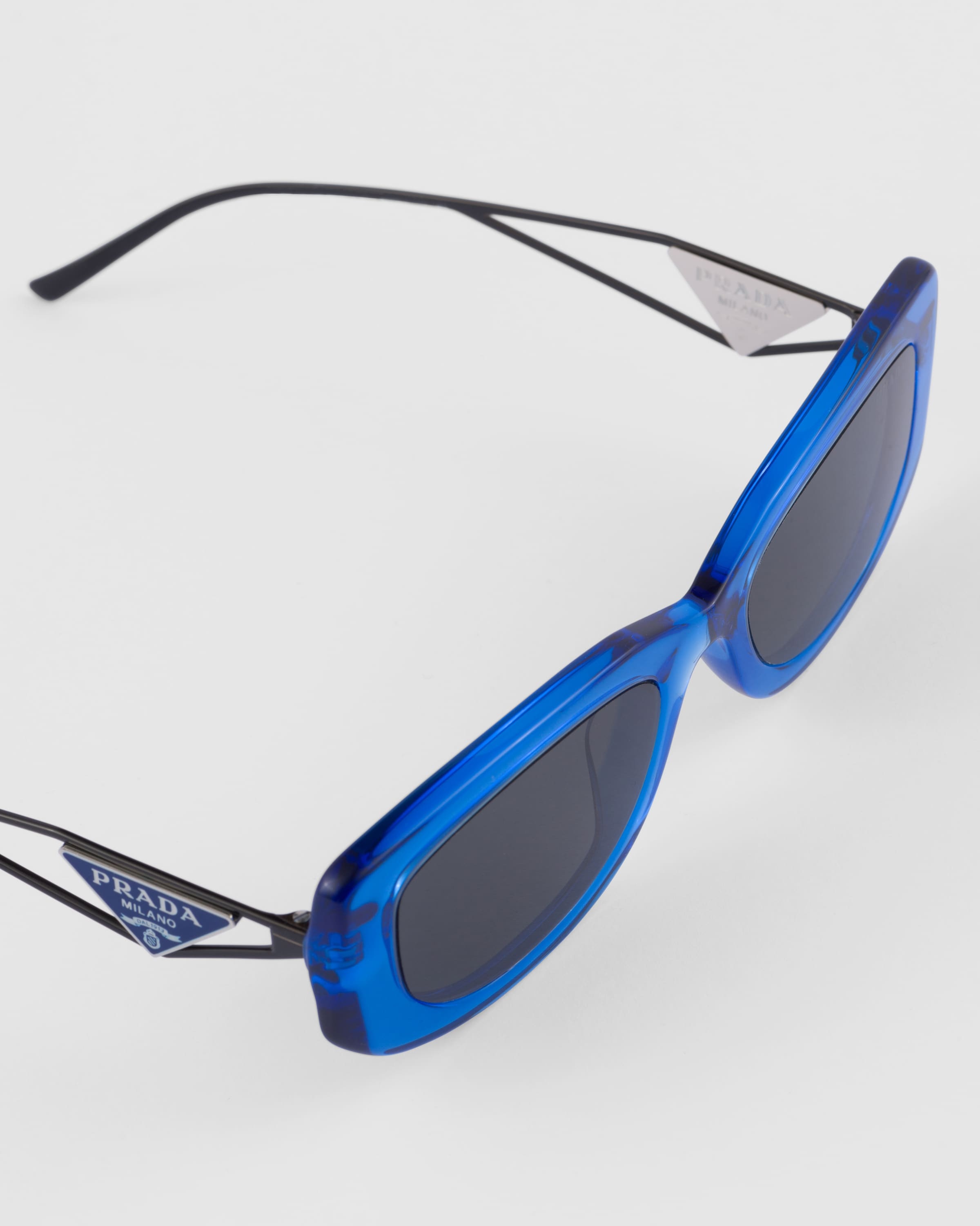Prada Sunglasses with triangle logo | REVERSIBLE Prada Sunglasses with triangle logo | REVERSIBLE