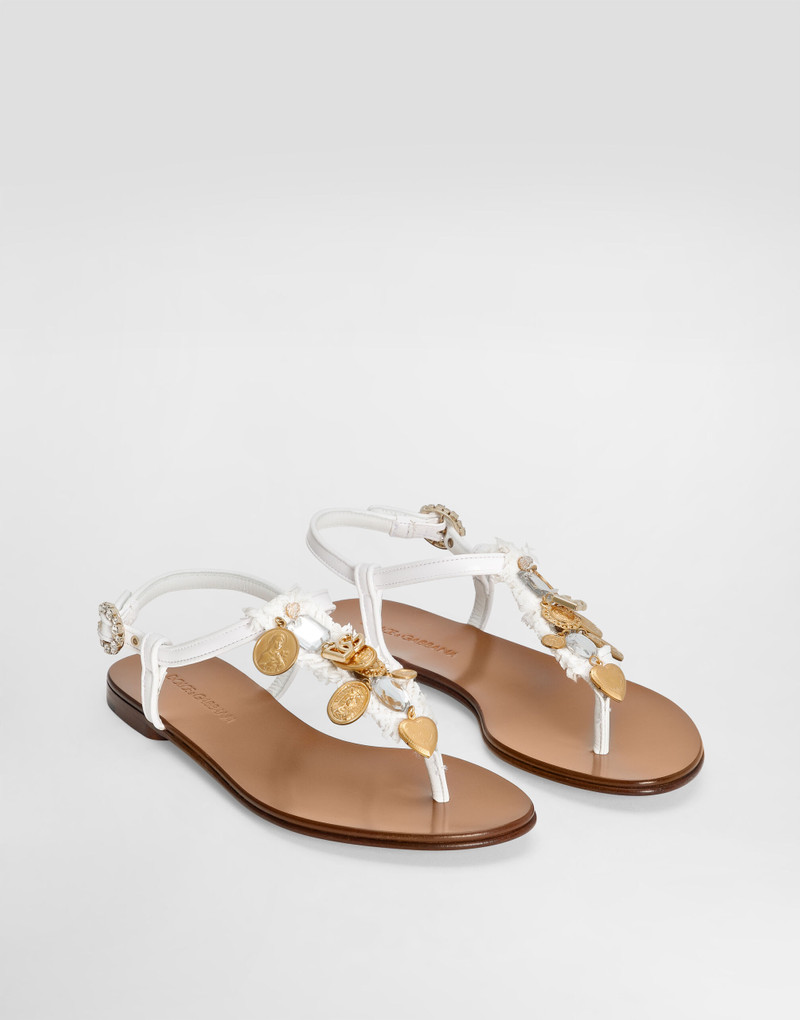 Raffia thong sandals with embroidered votive medallions 2
